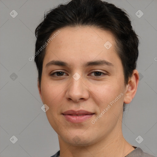 Joyful white young-adult female with short  brown hair and brown eyes