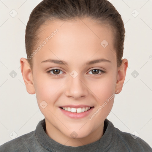 Joyful white child female with short  brown hair and brown eyes