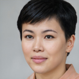 Joyful asian young-adult female with short  black hair and brown eyes