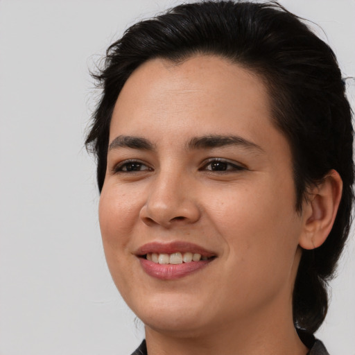 Joyful asian young-adult female with medium  brown hair and brown eyes