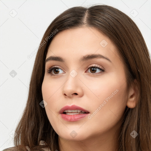 Neutral white young-adult female with long  brown hair and brown eyes