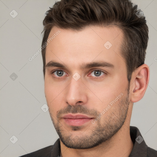 Neutral white young-adult male with short  brown hair and brown eyes