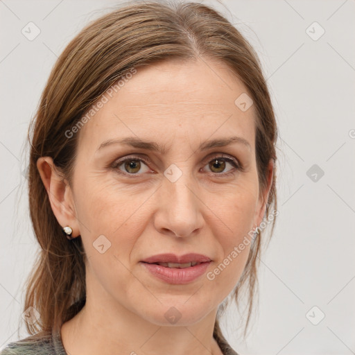 Joyful white adult female with medium  brown hair and grey eyes