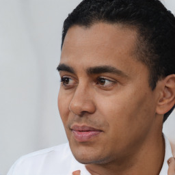 Neutral white young-adult male with short  black hair and brown eyes