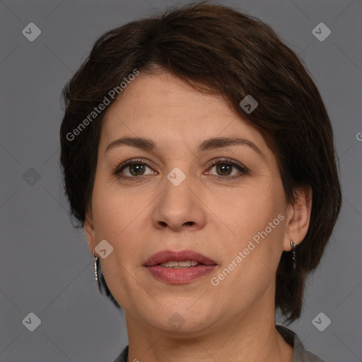 Joyful white adult female with medium  brown hair and brown eyes