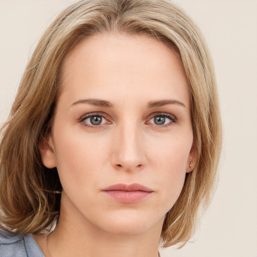 Neutral white young-adult female with long  brown hair and blue eyes