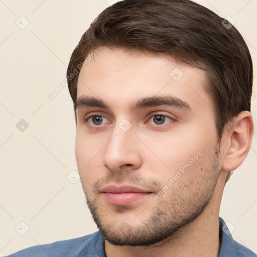 Neutral white young-adult male with short  brown hair and brown eyes