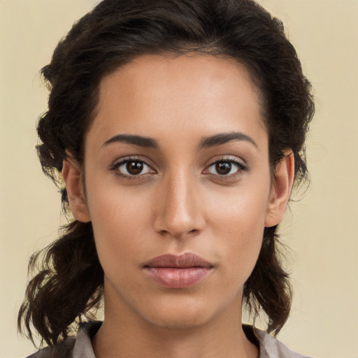 Neutral white young-adult female with medium  brown hair and brown eyes