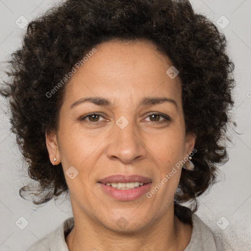 Joyful black adult female with medium  brown hair and brown eyes