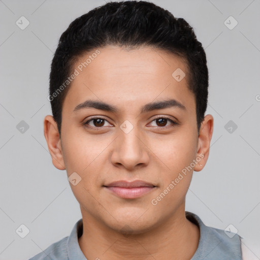 Joyful latino young-adult male with short  black hair and brown eyes