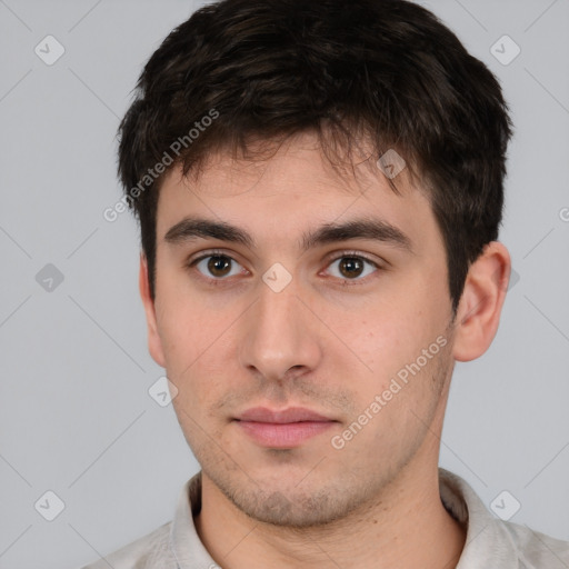 Neutral white young-adult male with short  brown hair and brown eyes