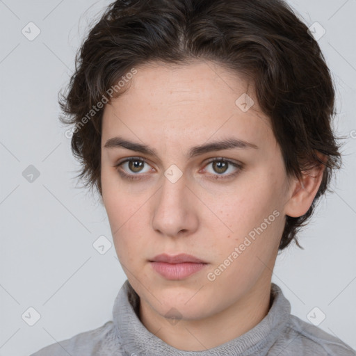 Neutral white young-adult female with medium  brown hair and brown eyes