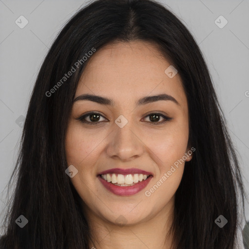 Joyful asian young-adult female with long  brown hair and brown eyes