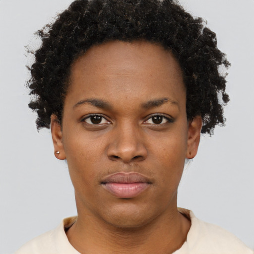 Neutral latino young-adult female with short  brown hair and brown eyes