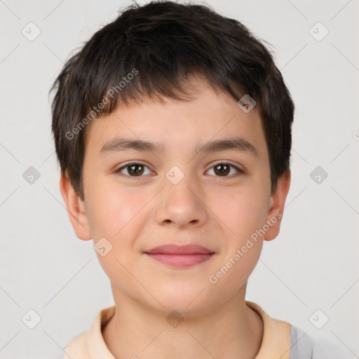 Joyful white child male with short  brown hair and brown eyes