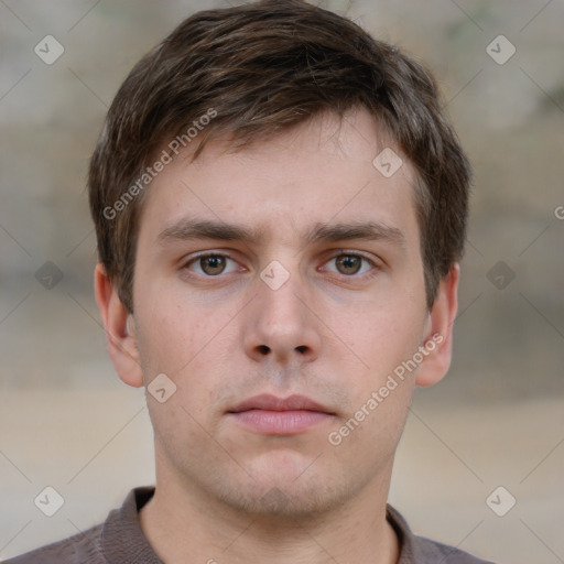 Neutral white young-adult male with short  brown hair and grey eyes