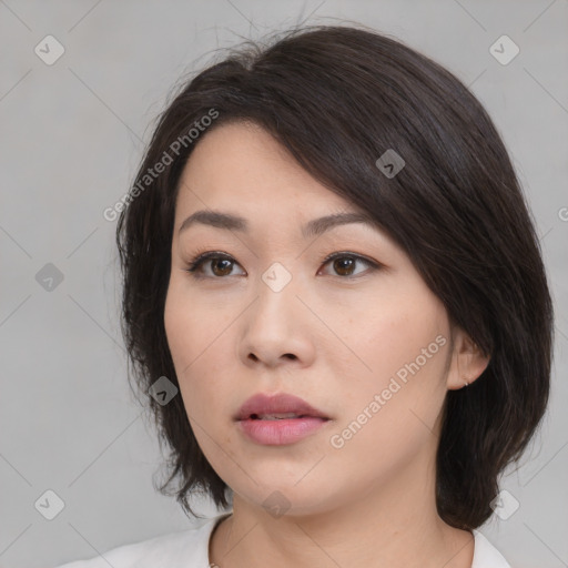 Neutral white young-adult female with medium  brown hair and brown eyes