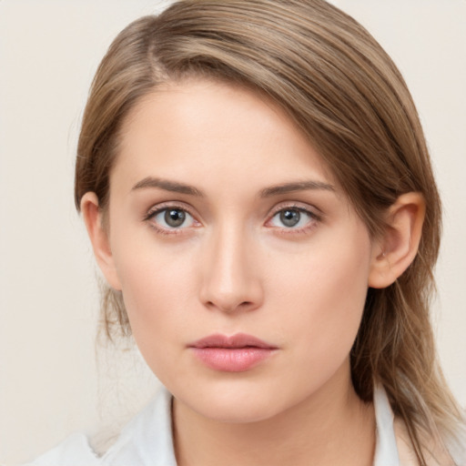 Neutral white young-adult female with medium  brown hair and brown eyes