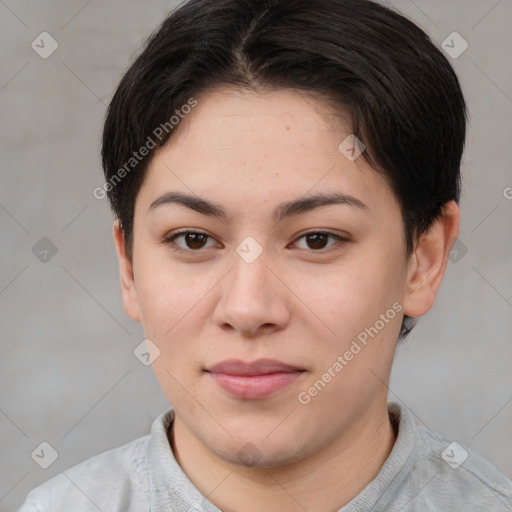 Joyful asian young-adult female with short  brown hair and brown eyes