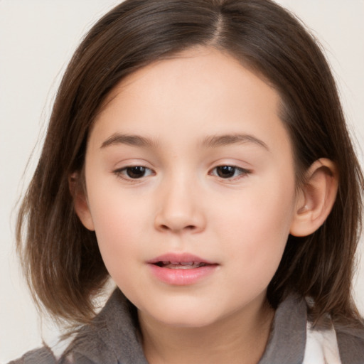 Neutral white child female with medium  brown hair and brown eyes