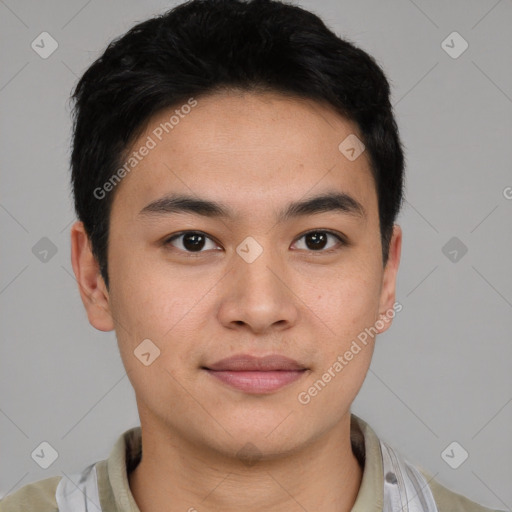 Joyful latino young-adult male with short  brown hair and brown eyes