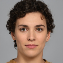 Neutral white young-adult female with short  brown hair and brown eyes