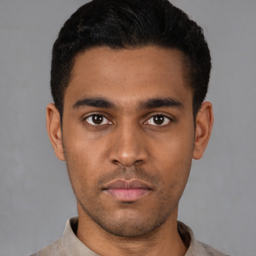 Neutral latino young-adult male with short  black hair and brown eyes