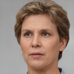 Neutral white adult female with short  brown hair and brown eyes