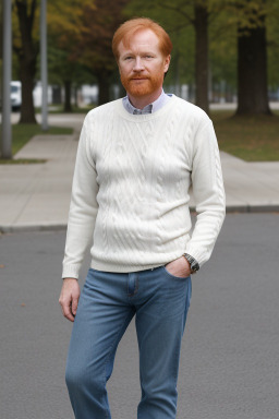 Caucasian middle-aged male with  ginger hair