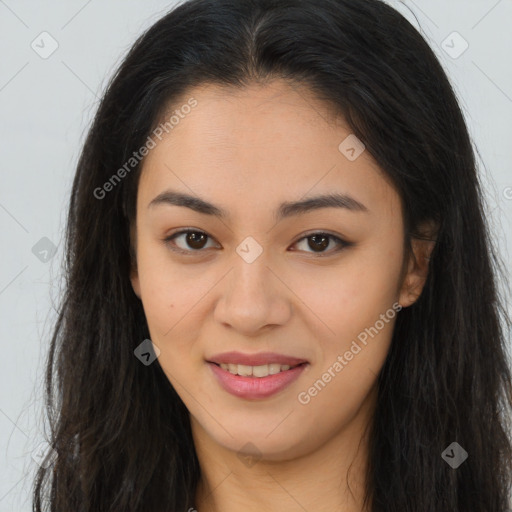 Joyful asian young-adult female with long  brown hair and brown eyes