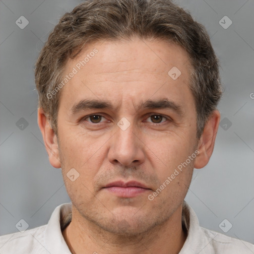 Neutral white adult male with short  brown hair and brown eyes