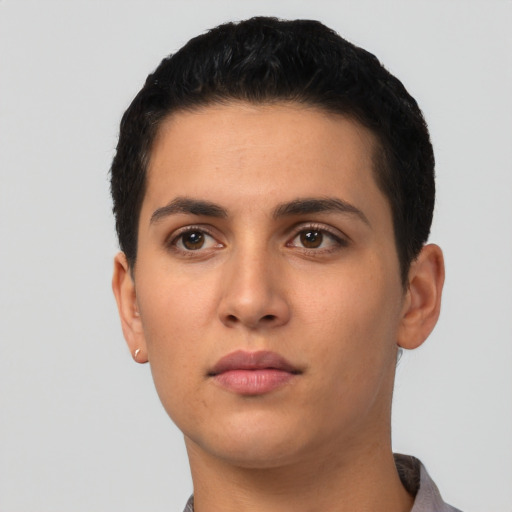 Neutral latino young-adult male with short  black hair and brown eyes