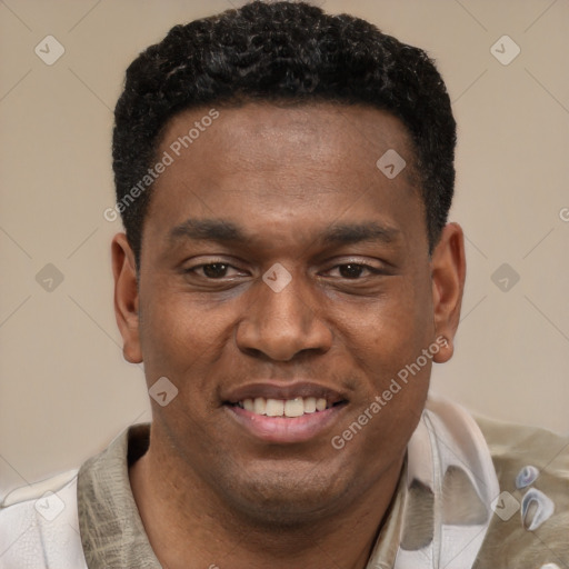Joyful latino young-adult male with short  brown hair and brown eyes