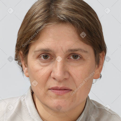 Joyful white adult female with short  brown hair and brown eyes