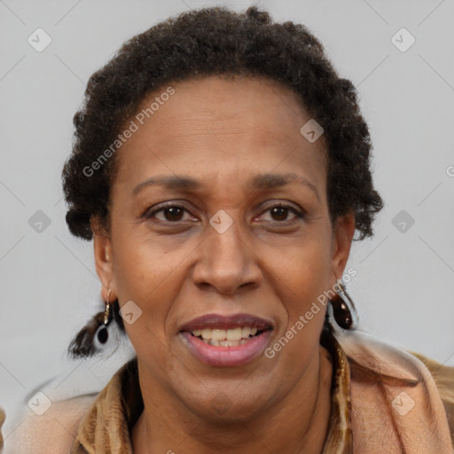 Joyful black adult female with short  brown hair and brown eyes