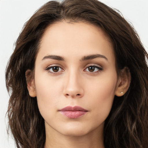 Neutral white young-adult female with long  brown hair and brown eyes