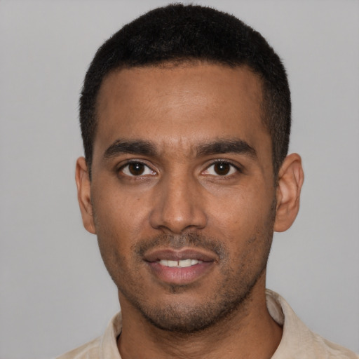 Neutral black young-adult male with short  black hair and brown eyes