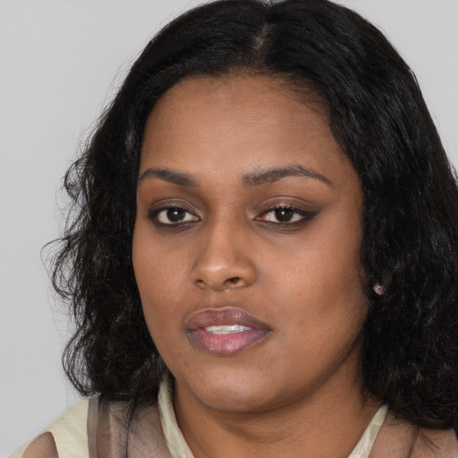 Neutral black young-adult female with long  black hair and brown eyes