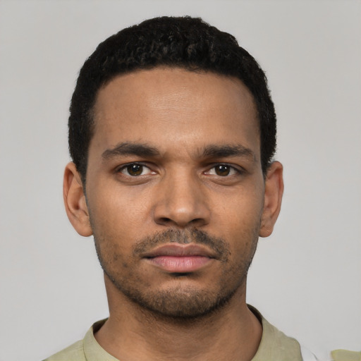Neutral black young-adult male with short  black hair and brown eyes