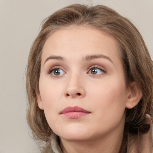 Neutral white young-adult female with medium  brown hair and grey eyes