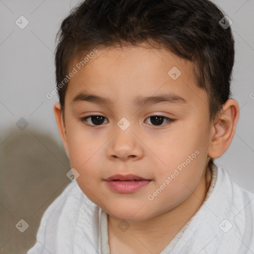 Joyful white child male with short  brown hair and brown eyes