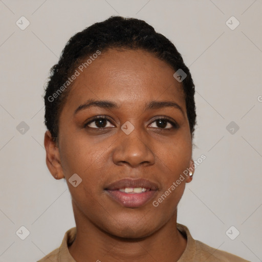 Joyful black young-adult female with short  black hair and brown eyes