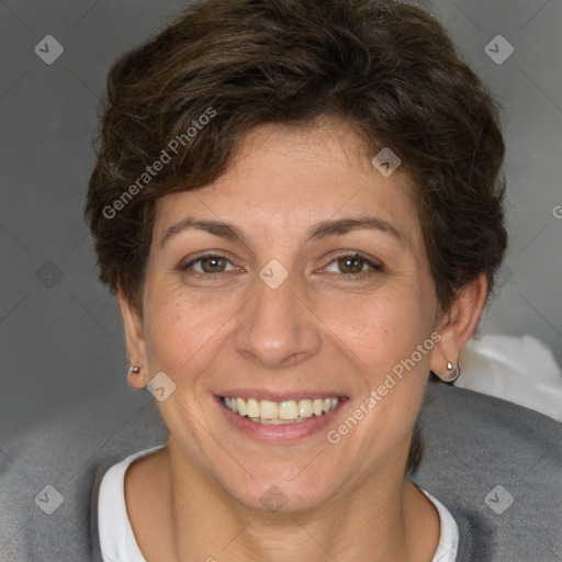 Joyful white adult female with short  brown hair and brown eyes