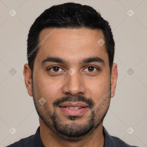 Joyful latino young-adult male with short  black hair and brown eyes