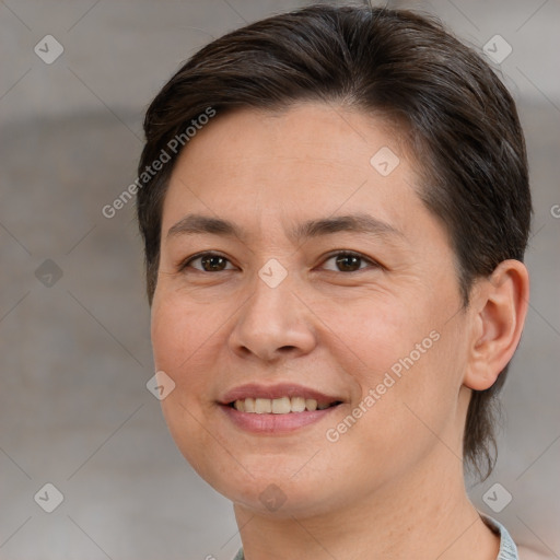 Joyful white adult female with medium  brown hair and brown eyes