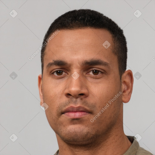 Neutral latino young-adult male with short  black hair and brown eyes