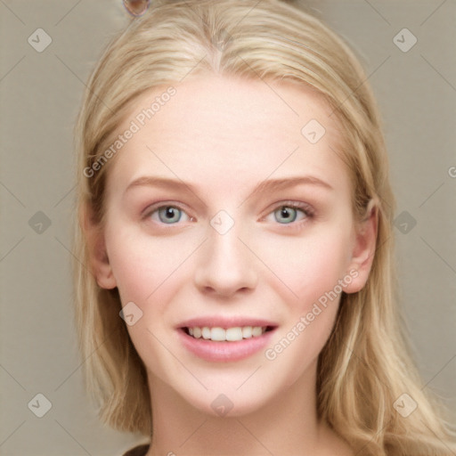 Joyful white young-adult female with long  brown hair and blue eyes