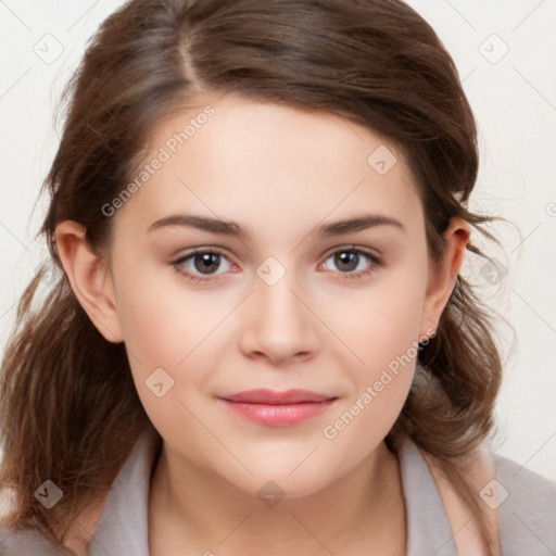 Joyful white child female with medium  brown hair and brown eyes