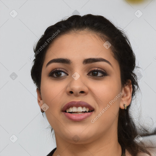 Joyful latino young-adult female with medium  black hair and brown eyes