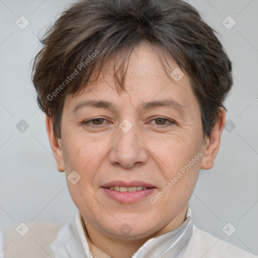 Joyful white adult female with short  brown hair and brown eyes